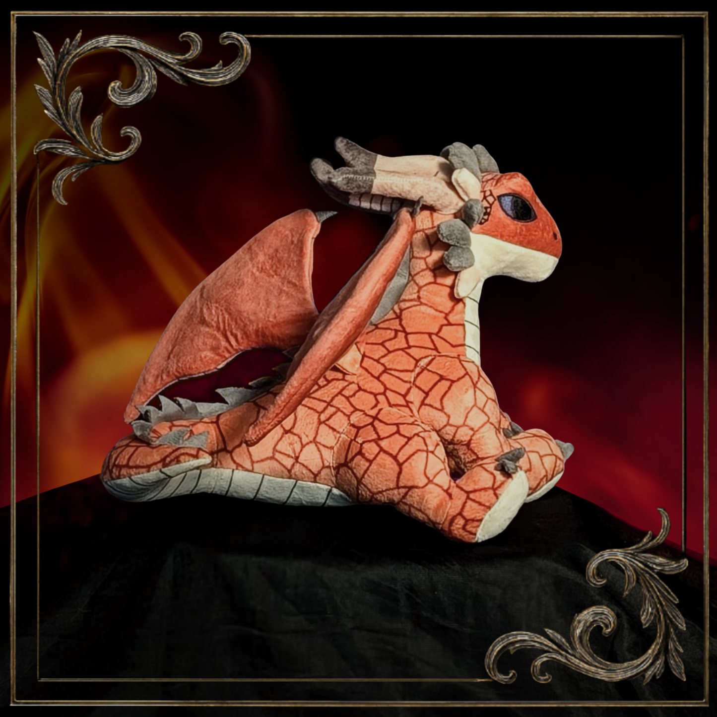 Plush dragon toy with blue eyes